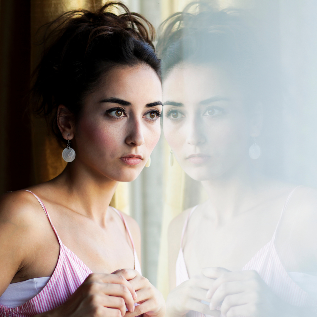 girl looking out window